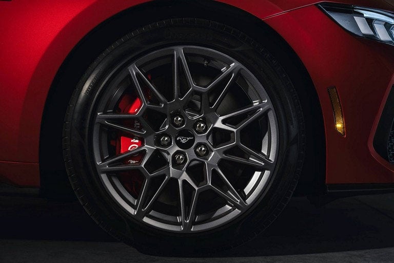 2024 Ford Mustang® model with a close-up of a wheel and brake caliper | Roland Rich Ford, Inc. in Delavan IL
